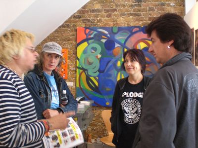 Charlie and Knox discuss their paintings - photo by Yuko