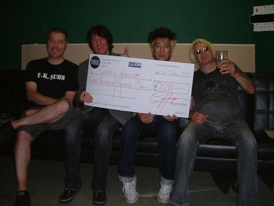 L to R: Mark, Alvin, Jet & Charlie with comedy sized cheque made by Rob. Click to enlarge